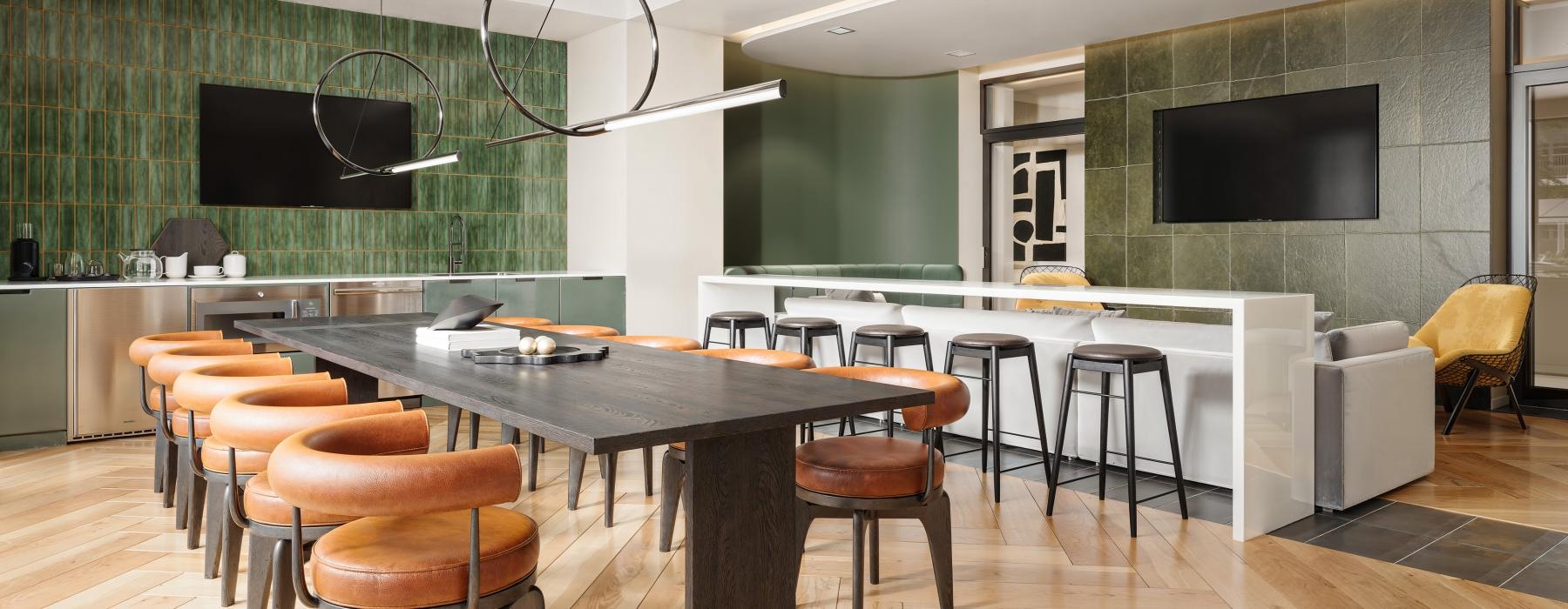 a kitchen with a table and chairs