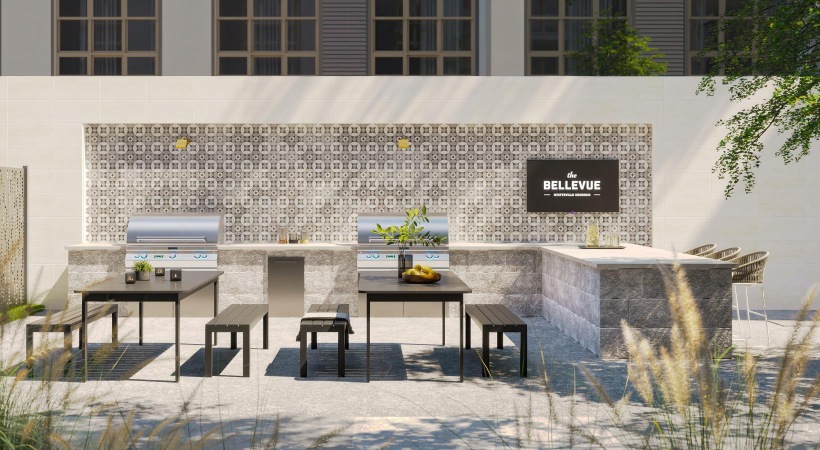 Grilling station and lush landscaping